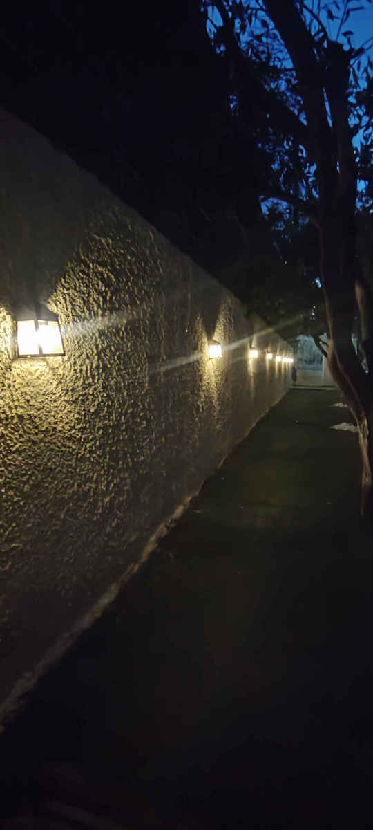Set of 4 Wall Solar Lights Warm White 3000K with Photocell