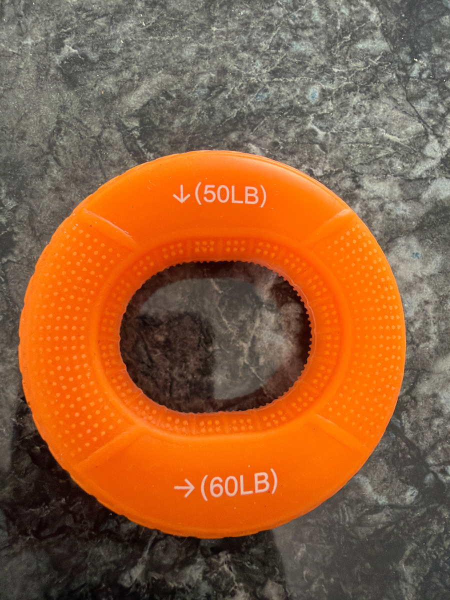 Uncle George Power Greifer Ring Für Finger- und Handtraining Orange Mit Maximalem Widerstand Bis 27kg