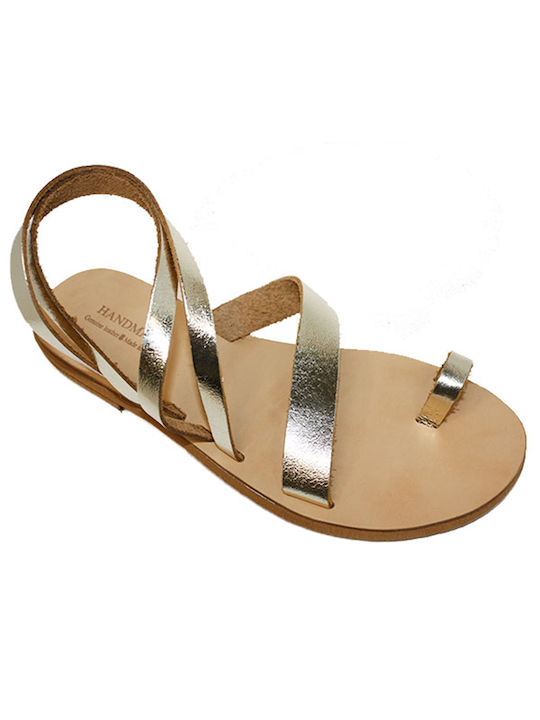 Women's leather sandals in gold color