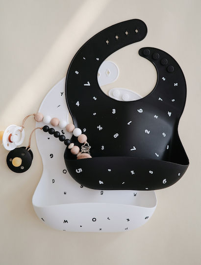 Mushie Letters Waterproof Bib Silicone with Button & Pocket Black