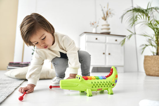 Fisher Price Musikinstrument Krokodil mit Musik für 3++ Monate