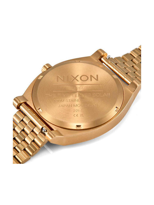 Nixon Time Teller Herrenuhr 40mm Solar mit Gold Metallarmband