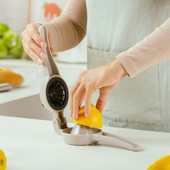 Nava Hand Press Lemon made of Plastic in Yellow Color