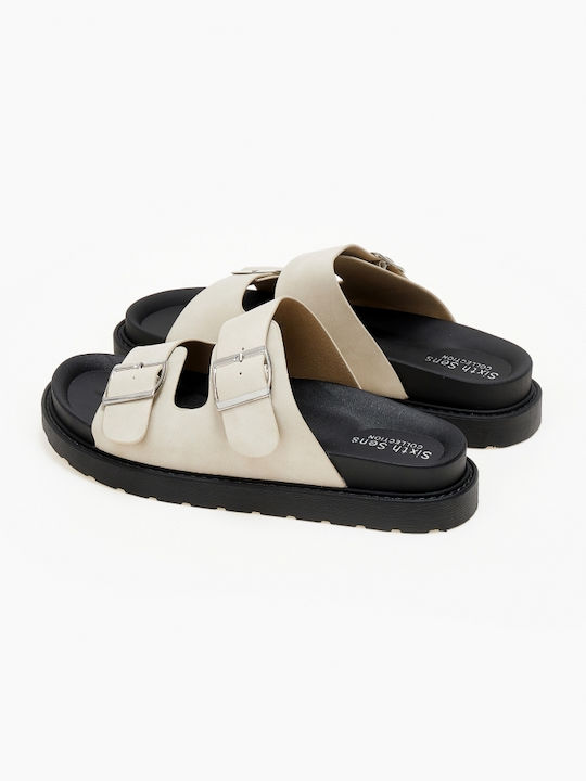 Flatform-Sandalen aus Wildleder in Beige