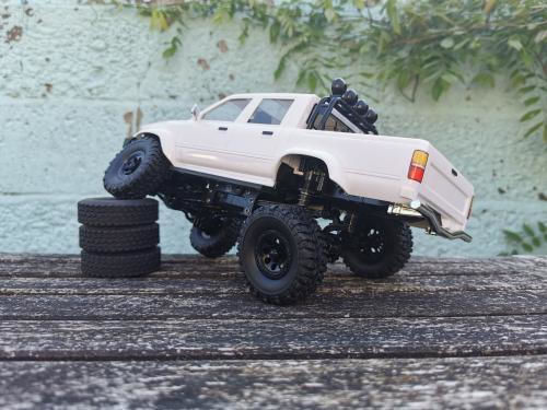 Wpl C64-1 RC Car Toyota Hilux Four-Wheel Drive Lifted 1/14 2.4g 4WD RTR Proportional Control White