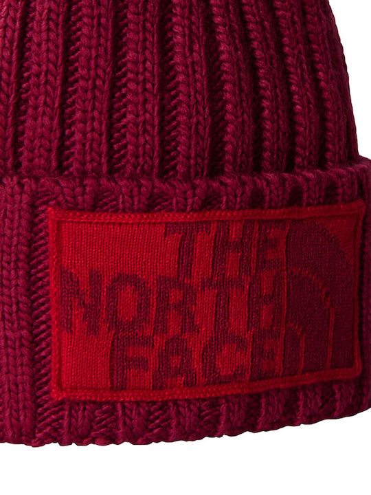 The North Face Pom Pom Beanie Unisex Beanie Knitted in Burgundy color