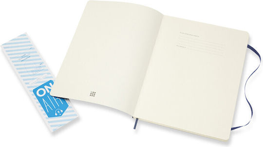 Cover Notizbuch mit leeren Seiten und Gummiband Blau