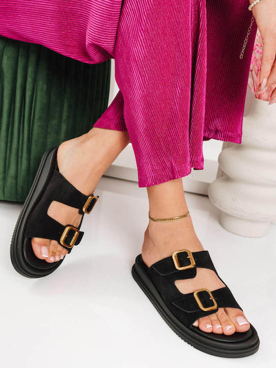 Schwarze Flatforms mit Doppelriemen und Metallösen