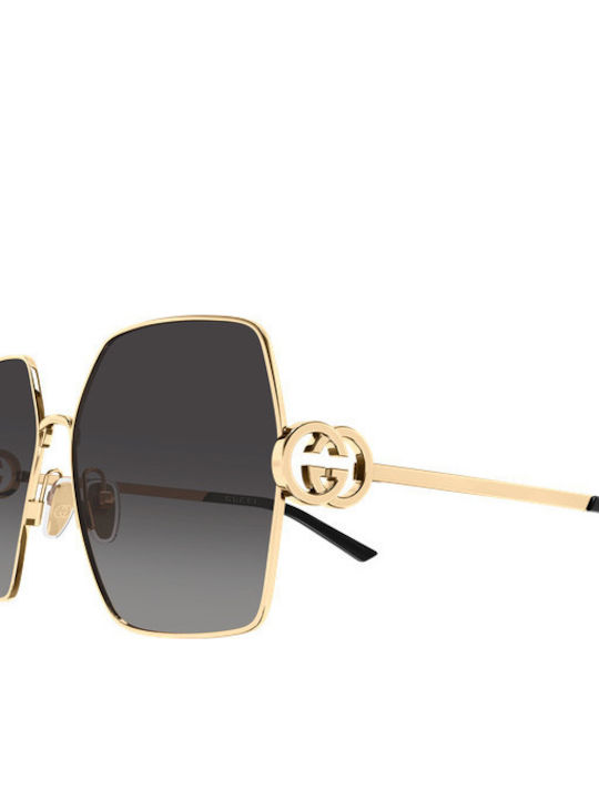 Gucci Woman Sunglasses with Gold Metallic Frame and Grey Lens GG2163S 001