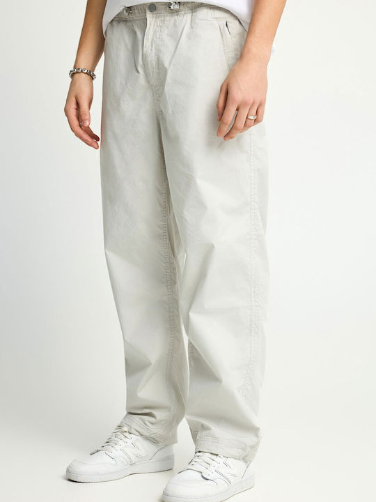 Trousers in Loose Fit Beige