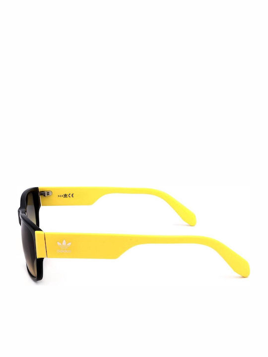 adidas Unisex Sunglasses with Black Plastic Frame and Yellow Gradient Lens OR0007 001