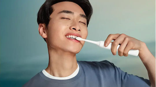 Philips Sonicare Electric Toothbrush with Pressure Sensor and Travel Case