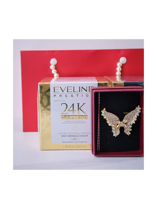 Set Cadou Tenderness Brosa Martisor Fluture Cremă De Zi Anti-îmbătrânire Cu Caviar De Melc 50 Ml Ser Facial Cu Caviar De Melc Eveline Prestige În Husă Elegantă Stil Geantă Roșu Aurie