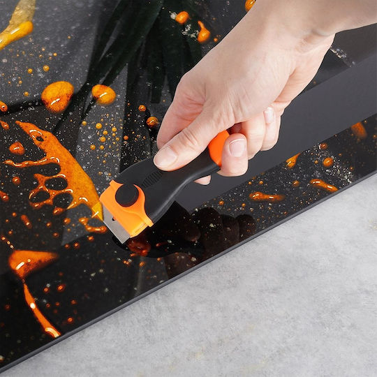 Răzuitor pentru plăci ceramice cu lame interschimbabile