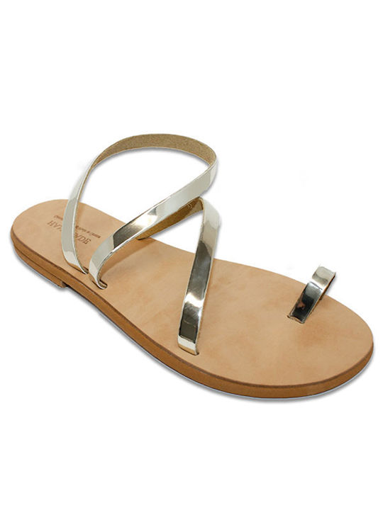 Women's leather sandals in gold color