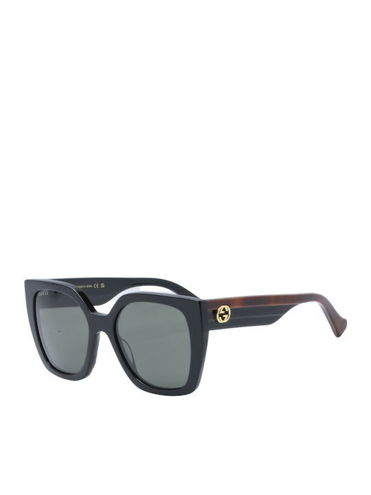 Gucci Women's Sunglasses with Black Plastic Fra...