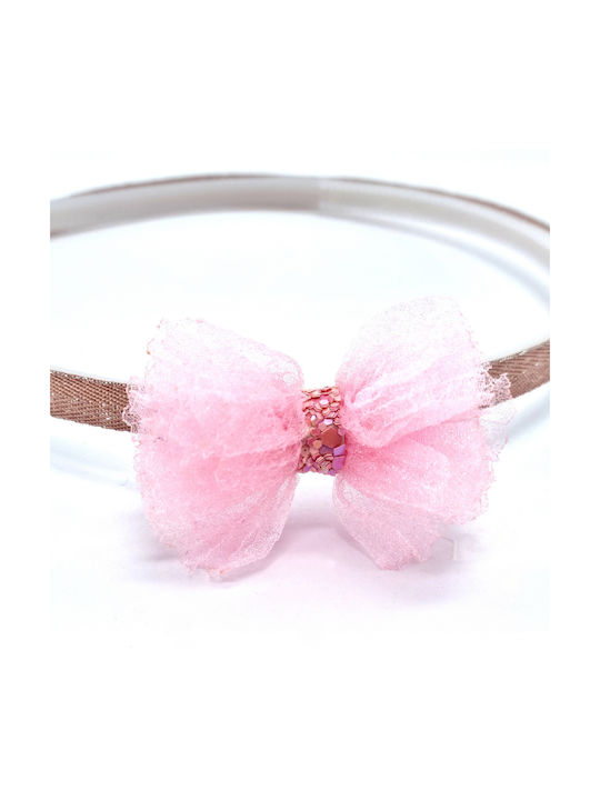 Children's hair cue with pink ribbon