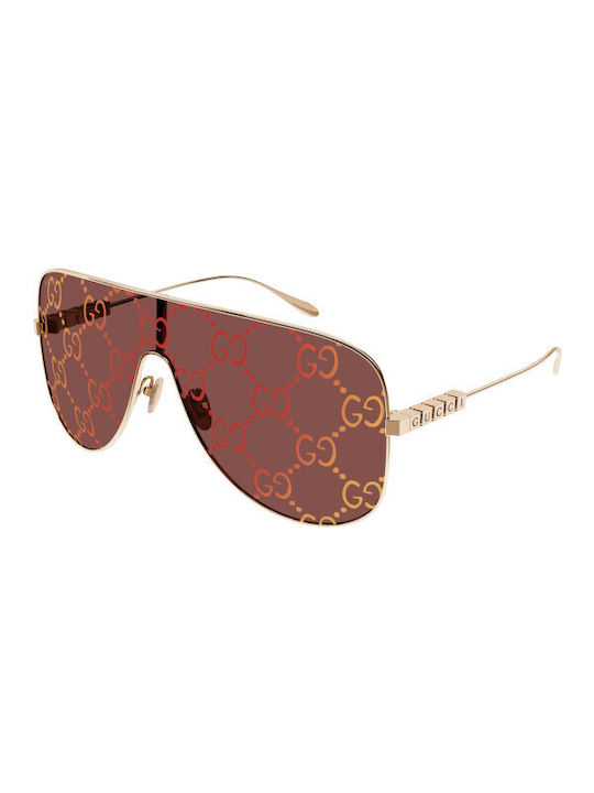 Gucci Sonnenbrillen mit Gold Rahmen und Beige L...