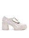 Pumps Mit Plateau Aus Lackleder Beigem