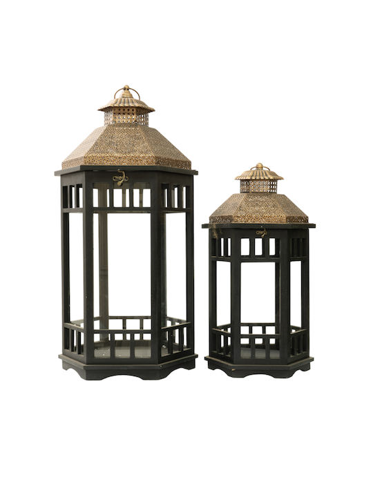 Set of two black polygonal lanterns with gold metal cap.size 39x34x79cm and 30,5x26,5x58cm