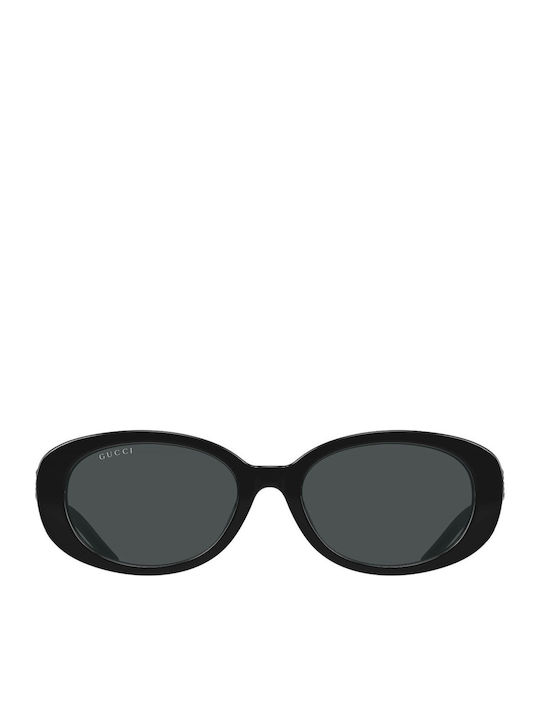 Gucci Women's Sunglasses with Black Plastic Fra...