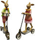 Osterdekoration Hase Mädchen Junge auf Roller 19 cm Mehrfarbig