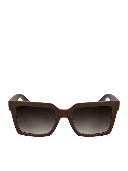 Calvin Klein Women's Sunglasses with Red Plasti...