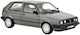 Machete Auto Volkswagen Golf Champion Grey Metallic 1989 1:18 Norev