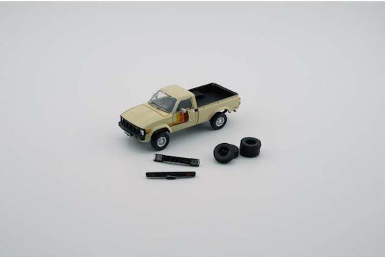 Machetă Mașină Toyota Hilux Crem Extra Roți și Bara 1:64 BM Creations