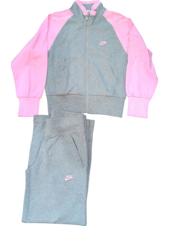 pink and white nike jogging suit