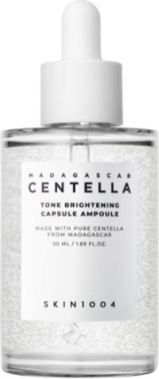 Skin1004 Madagascar Centella Tone Brightening Capsule Ampoule Успокояващ Ампула Серум за Лице с Centella Asiatica и Ниацинамид за Блясък и Пигментни петна 50ml