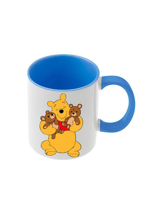 Winnie-Pooh-Tasse mit hellblauem Henkel und hel...
