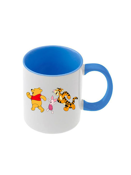 Winnie-Pooh-Tasse mit hellblauem Henkel und hel...